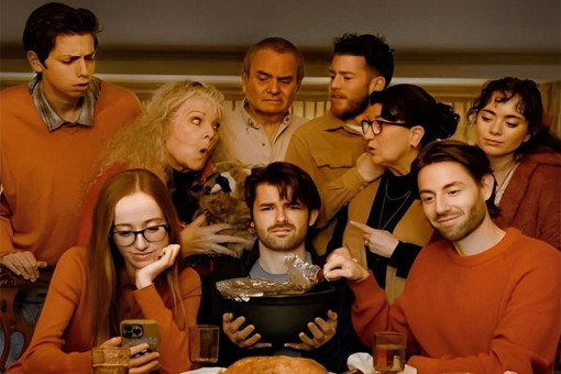 Family and friends at Thanksgiving dinner table